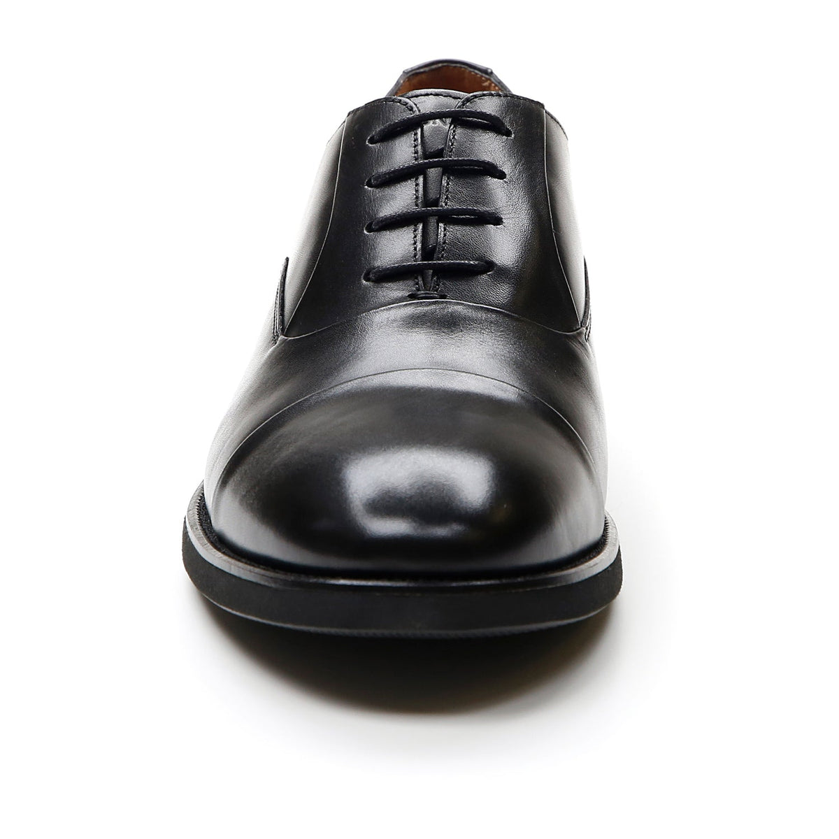 Men's black lace-up Oxford shoe with almond toe and low heel