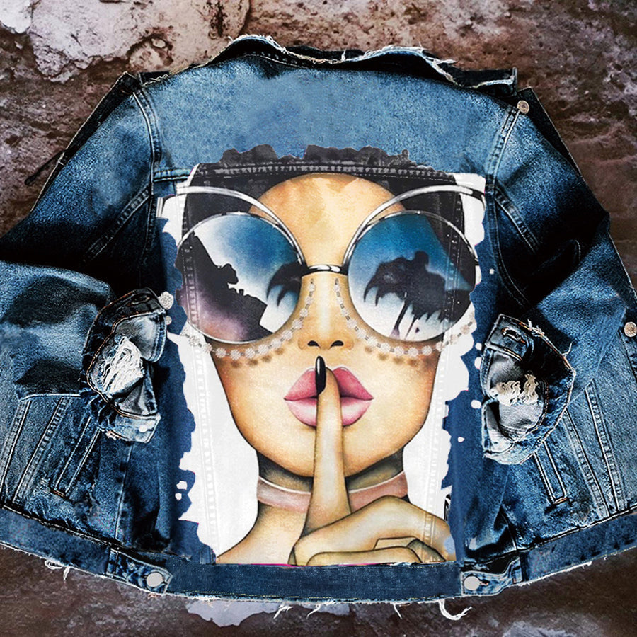 Women's printed denim jacket with portrait graphic and distressed details