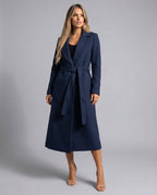 Women's navy longline wrap coat with notched lapels and tie belt