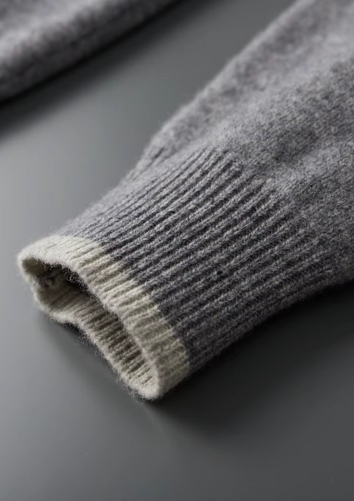 Men's two-tone grey knit tracksuit set with a zip jacket and drawstring trousers