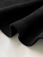 Women's black cropped sweatshirt with mock neck and long sleeves