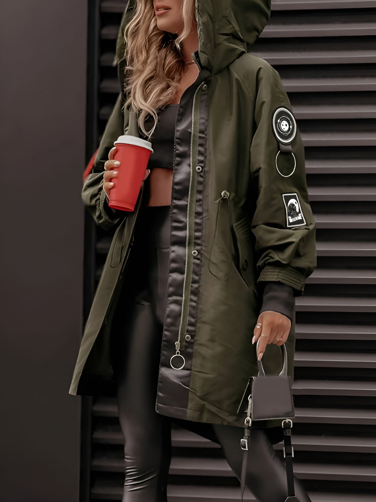 Women's oversized hooded windbreaker jacket with front pockets