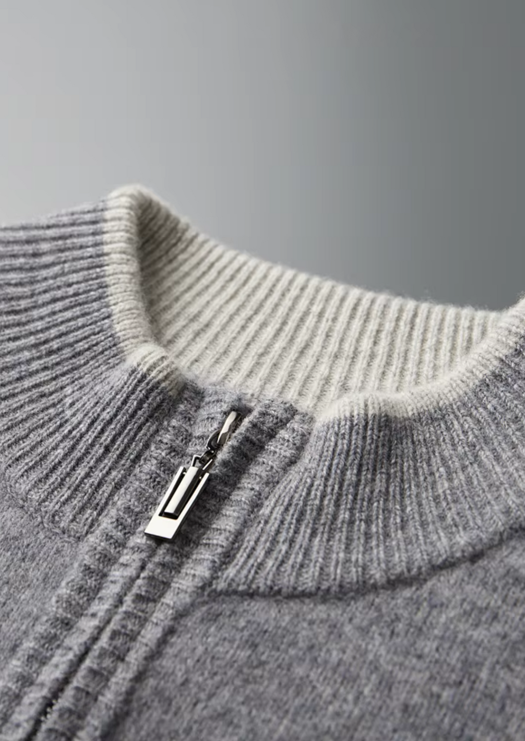 Men's two-tone grey knit tracksuit set with a zip jacket and drawstring trousers