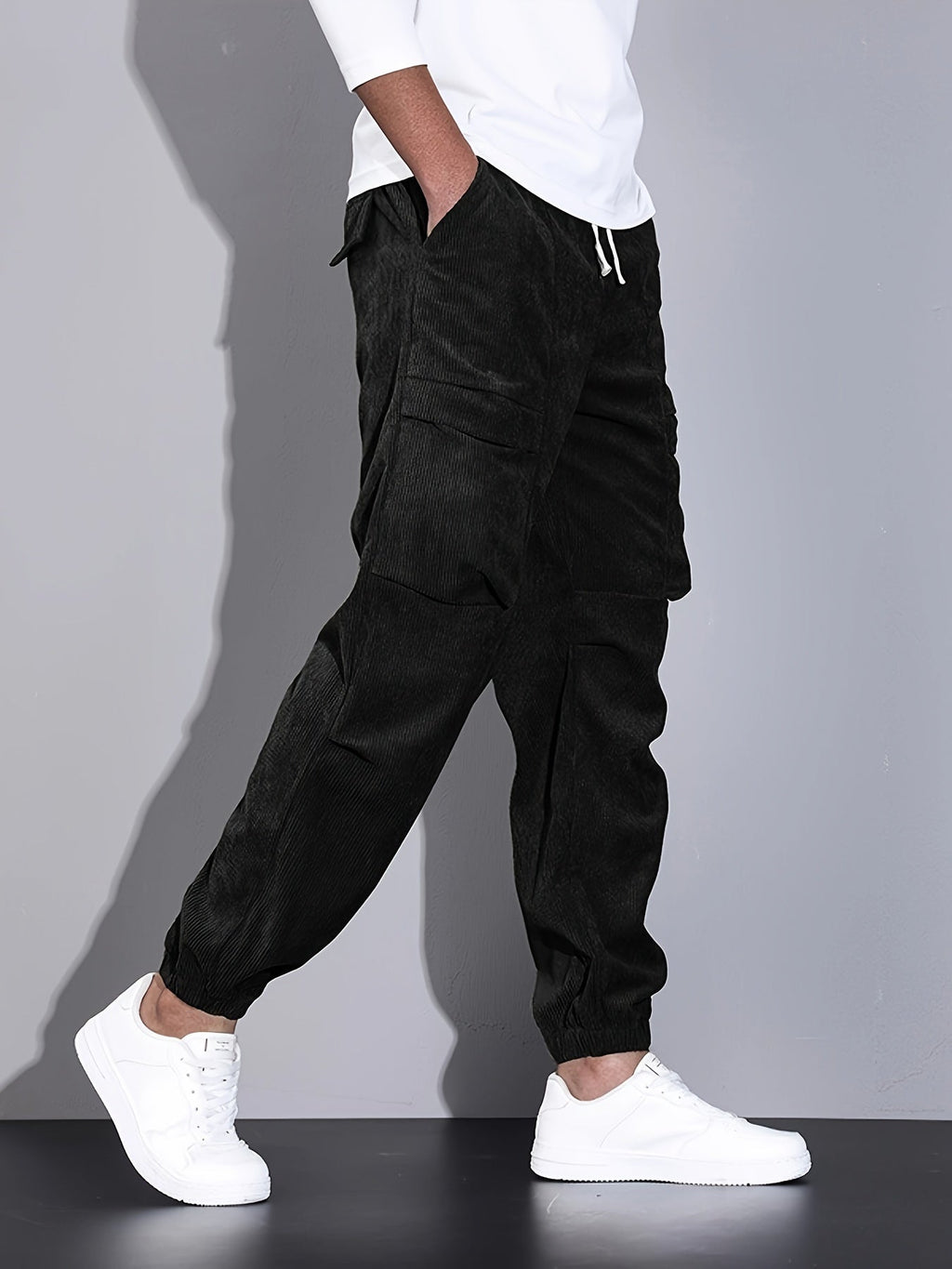 Men's corduroy cargo trousers with drawstring waist and cuffed hems