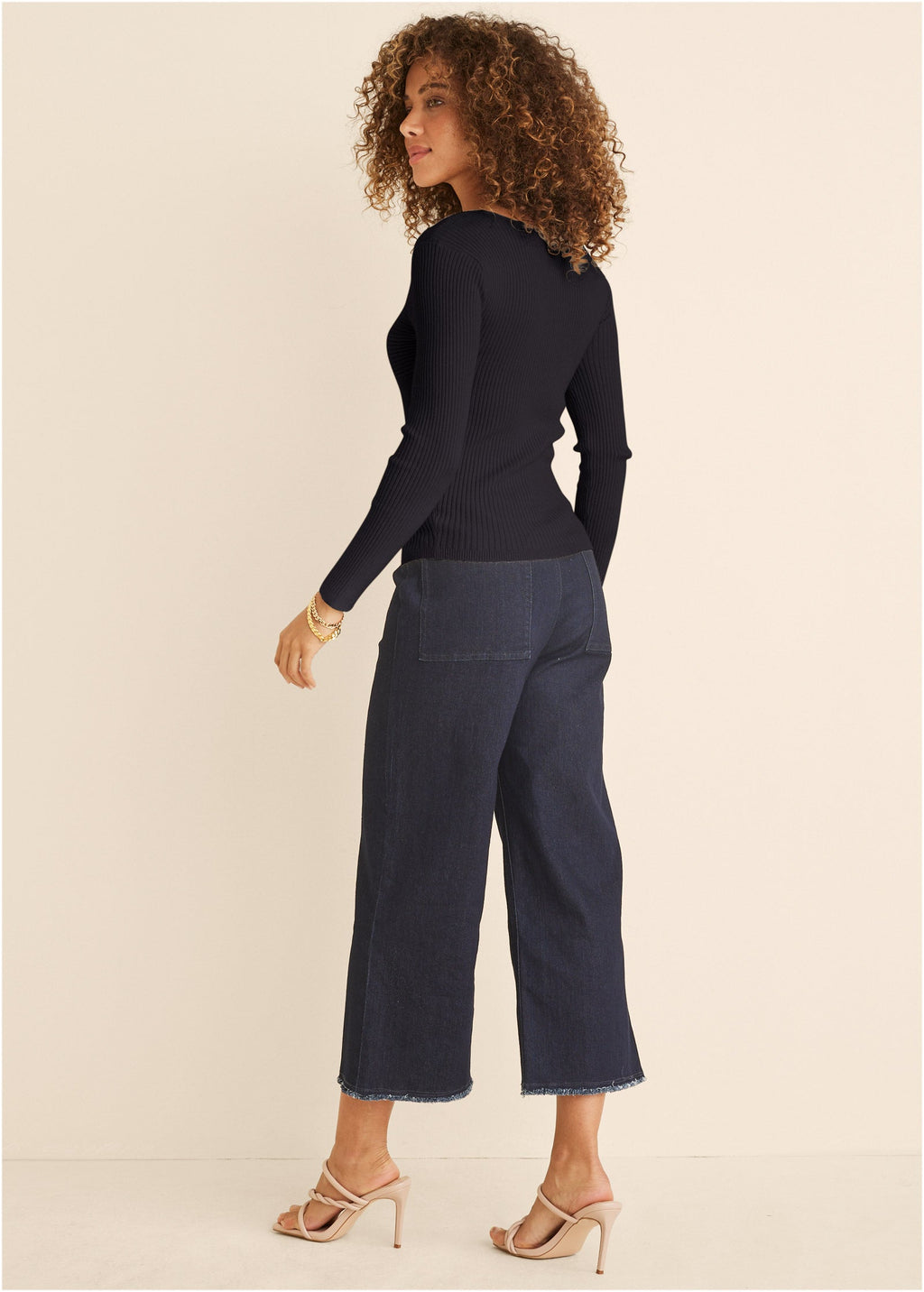 Women's black ribbed sweater with sweetheart neckline