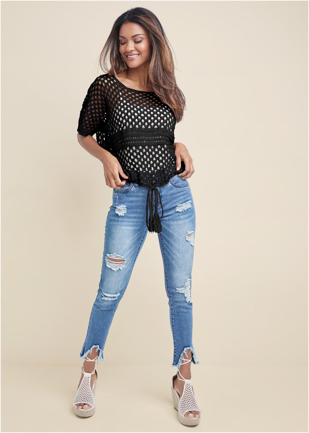 Women's black open-knit sweater with short sleeves, round neckline and tassel waist tie