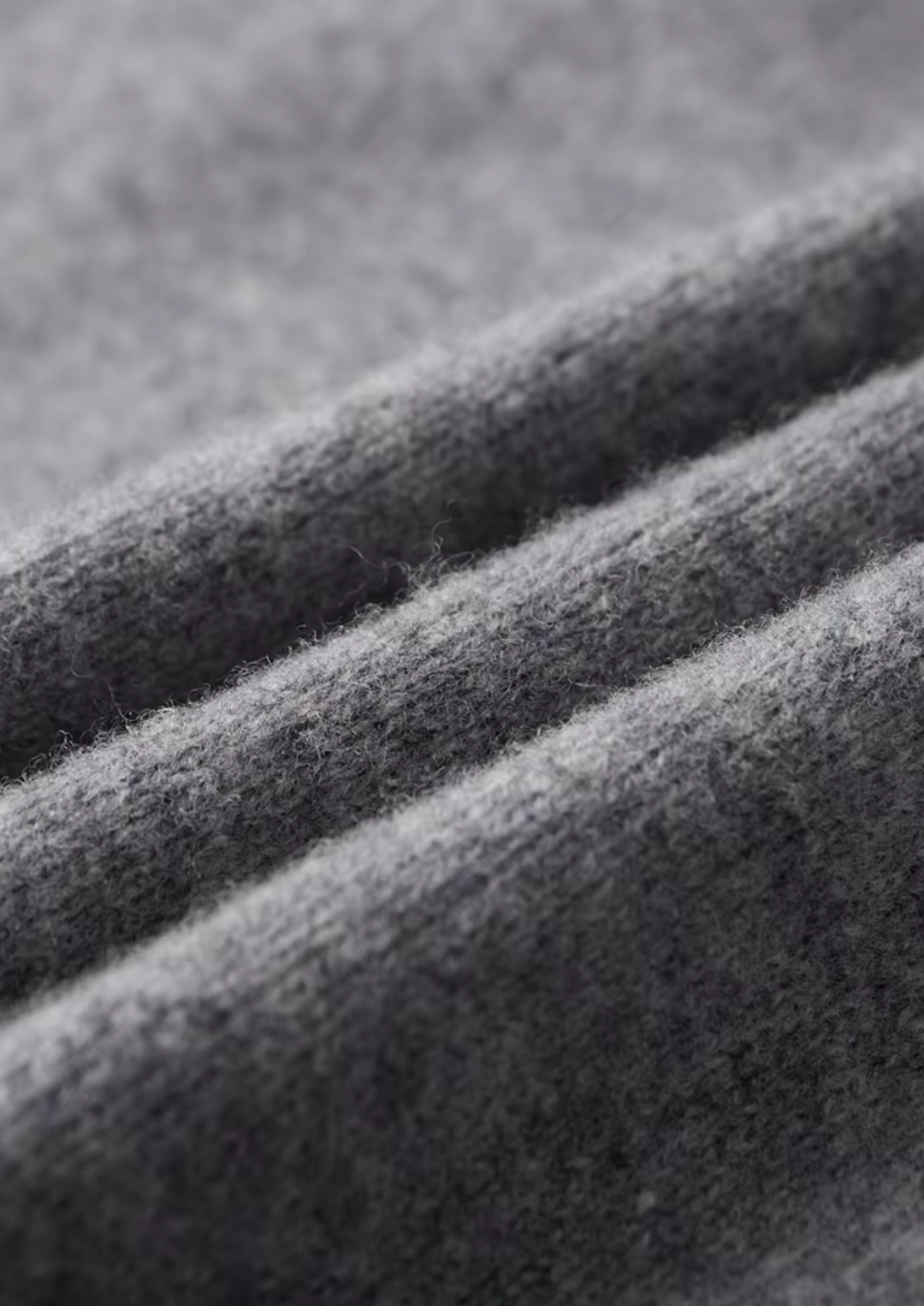Men's two-tone grey knit tracksuit set with a zip jacket and drawstring trousers