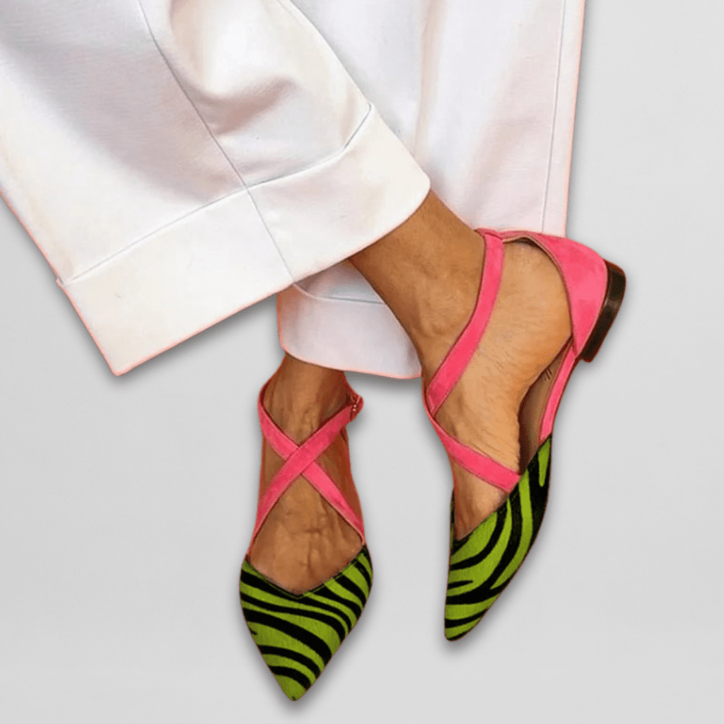 Women's pointed-toe ballet flats with cross-over ankle straps and striped toes