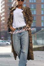Woman wearing a leopard print long sleeve midi trench coat