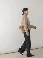 Women's plain turtleneck sweater with ribbed collar and cuffs