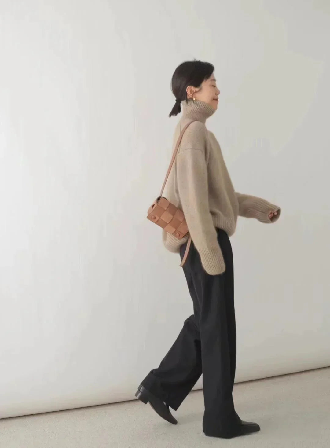 Women's plain turtleneck sweater with ribbed collar and cuffs