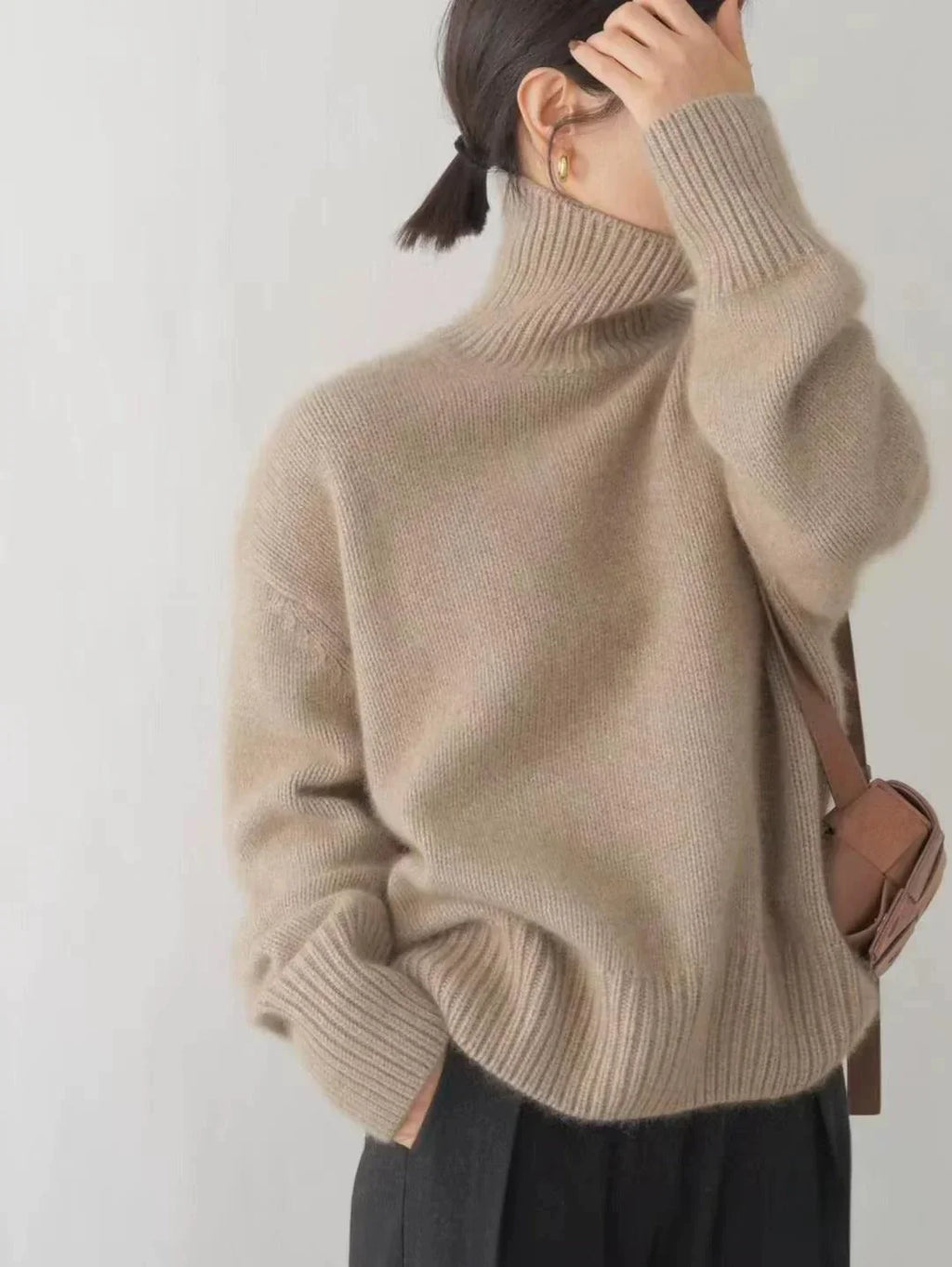 Women's plain turtleneck sweater with ribbed collar and cuffs