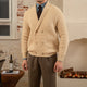 Men's textured knit cardigan with shawl collar and button fastening