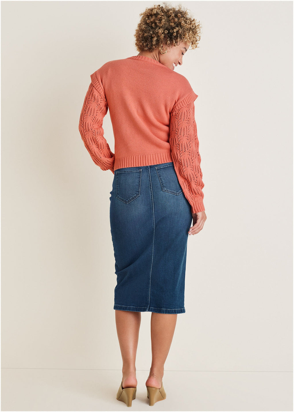 Women's coral crew neck sweater with pointelle sleeves