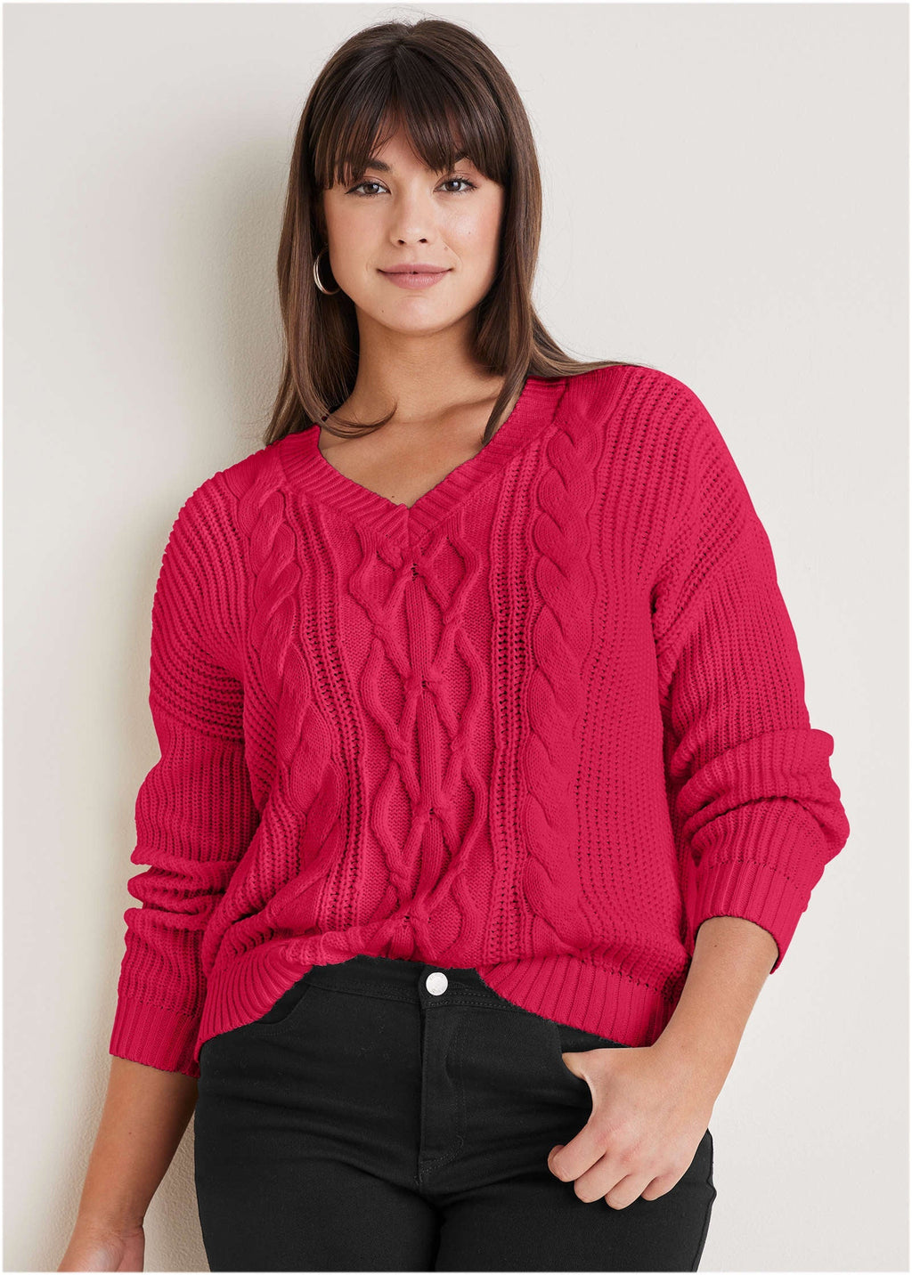 Women's red cable knit V-neck sweater with long sleeves