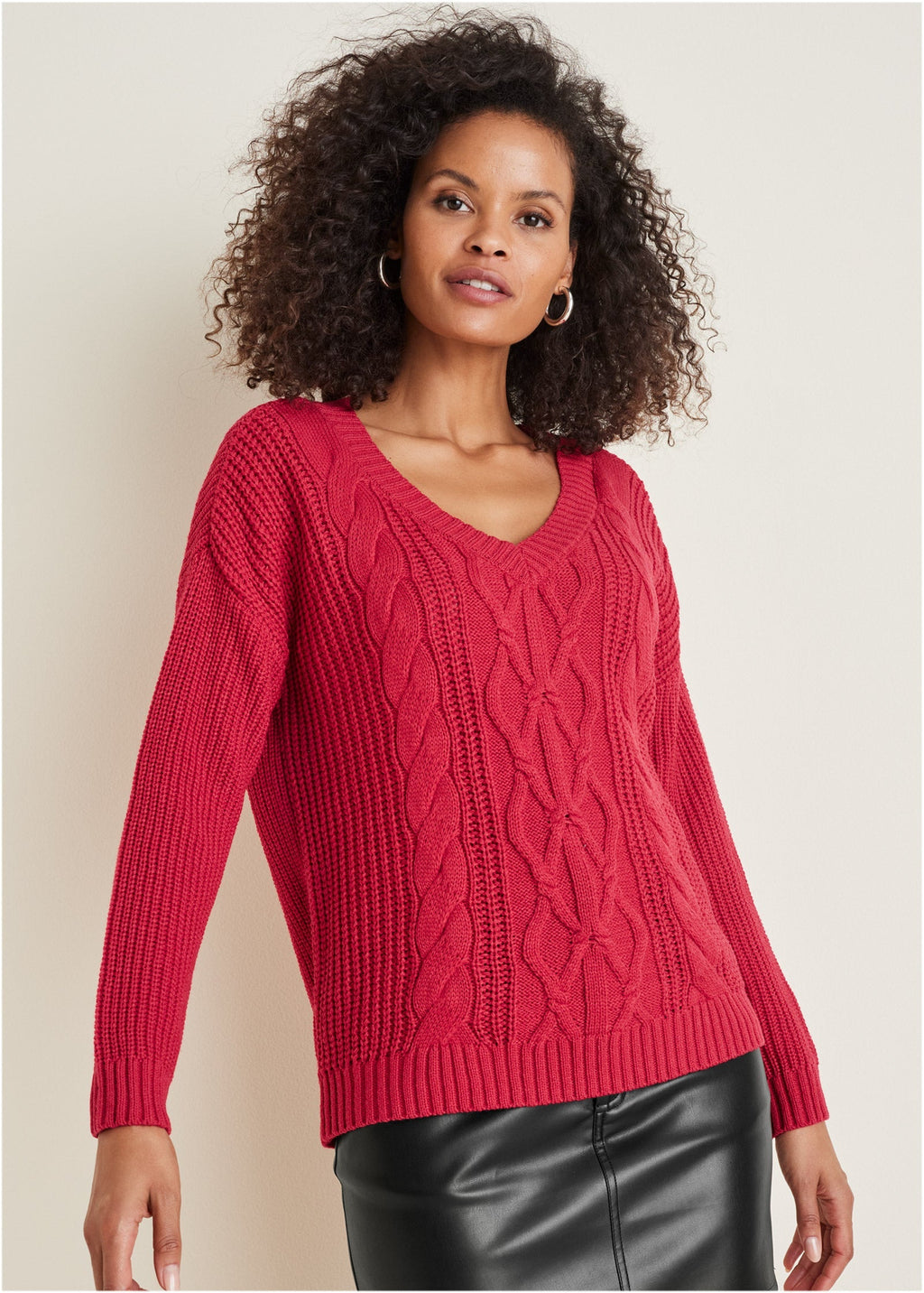 Women's red cable knit V-neck sweater with long sleeves