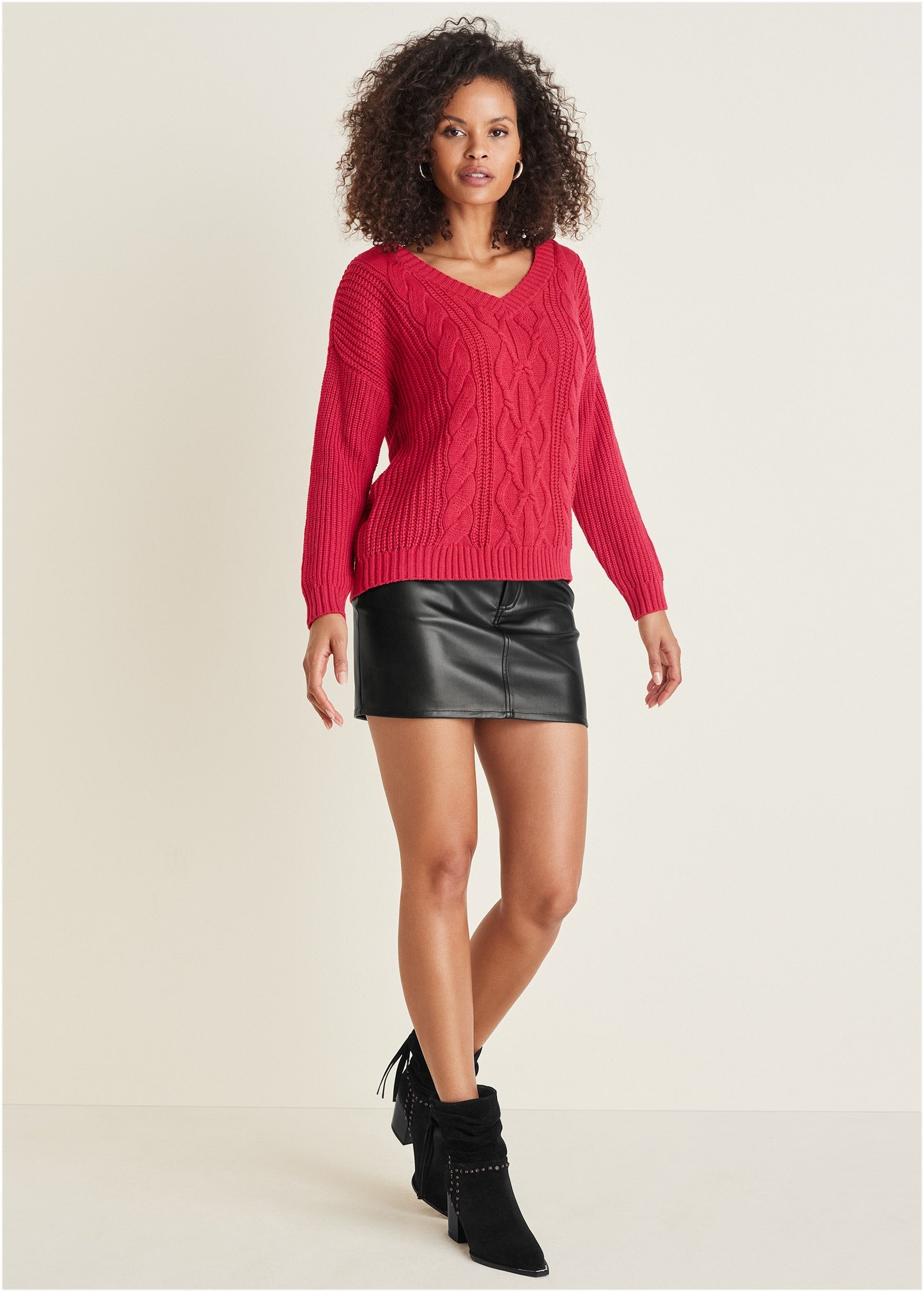 Women's red cable knit V-neck sweater with long sleeves