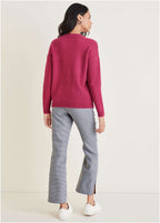 Women's pink knit sweater with crew neck and drawstring hem