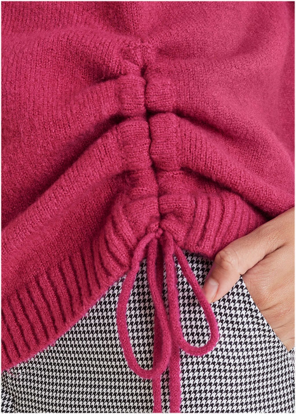 Women's pink knit sweater with crew neck and drawstring hem