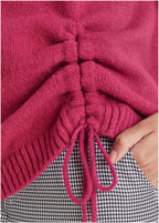 Women's pink knit sweater with crew neck and drawstring hem