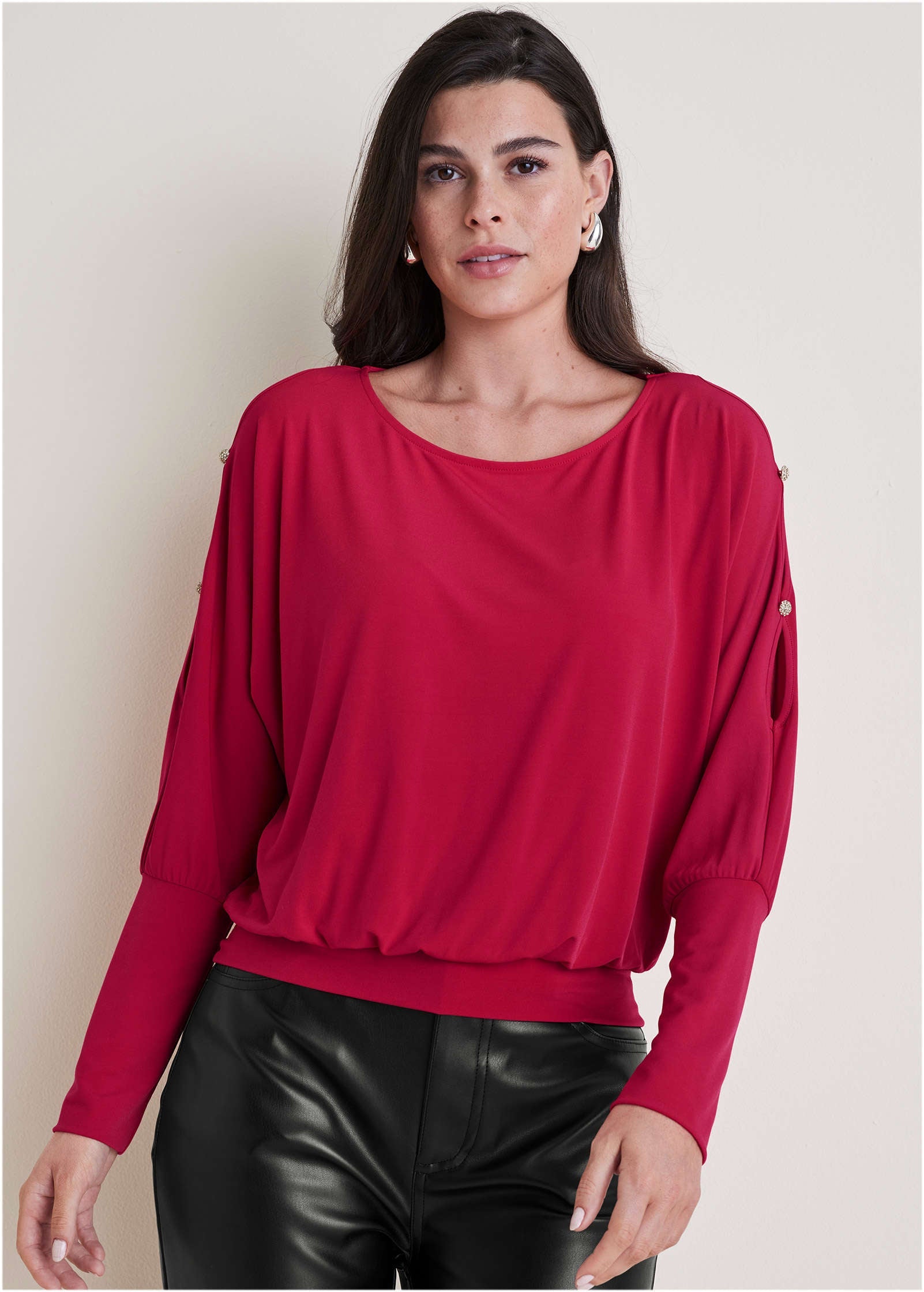 Women's red long sleeve blouse with round neckline and sleeve cutouts