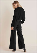 Women's black cropped cardigan with floral appliques and long sleeves