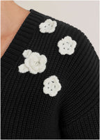 Women's black cropped cardigan with floral appliques and long sleeves