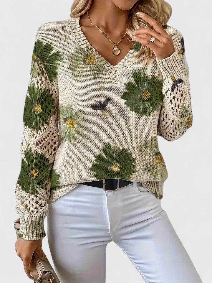 Women's floral V-neck sweater with long sleeves and open-knit sleeve panels