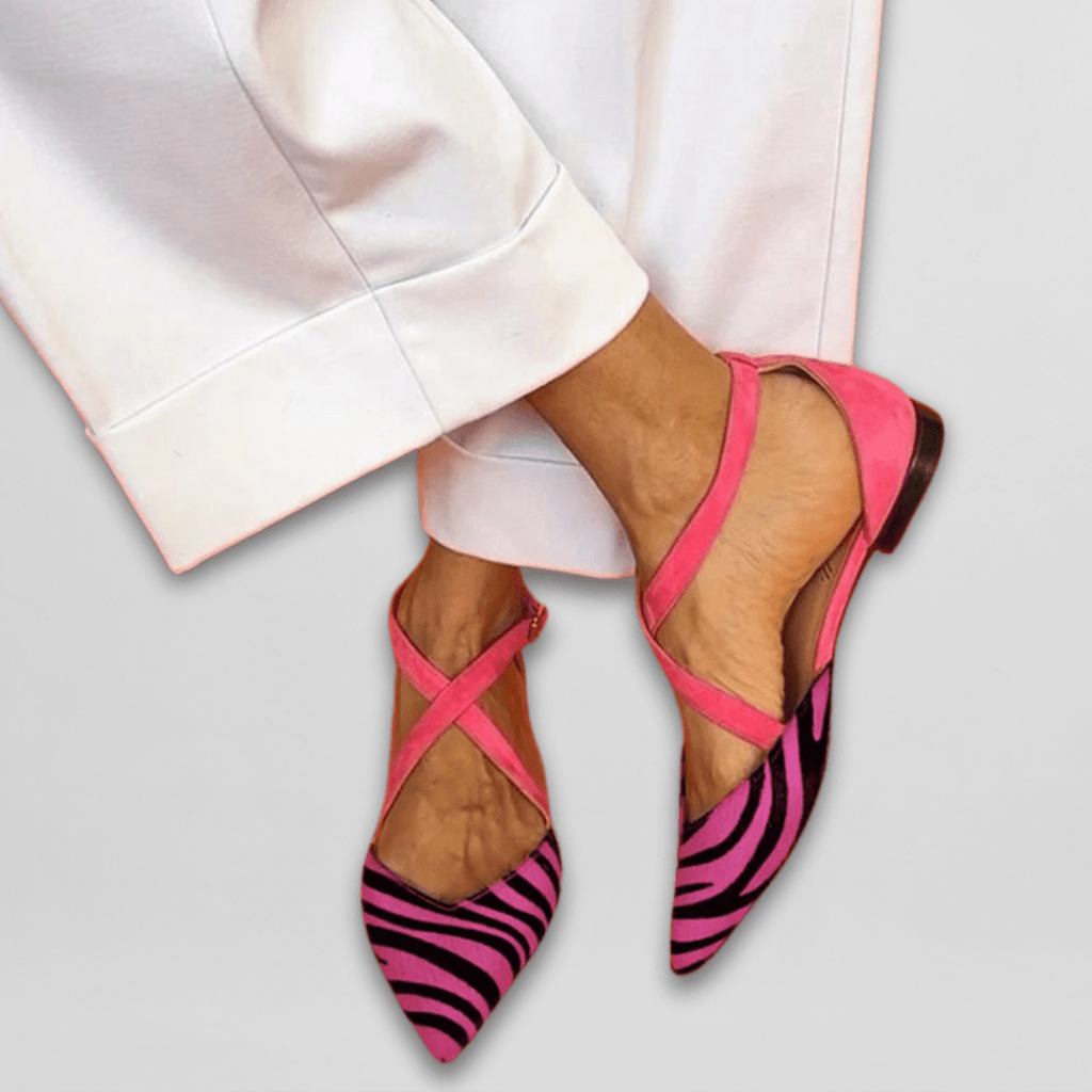 Women's pointed-toe ballet flats with cross-over ankle straps and striped toes