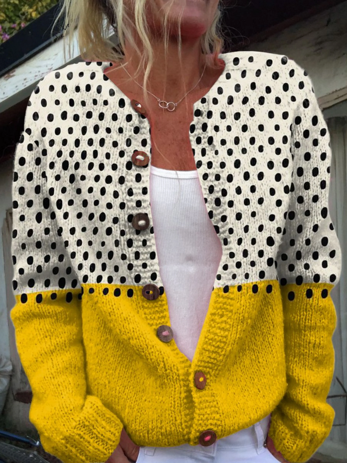 Women's cream and yellow polka dot cardigan with long sleeves and front buttons