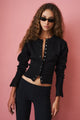 Women's black cropped knit cardigan with buttons and long sleeves