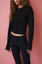 Women's black cropped knit cardigan with buttons and long sleeves