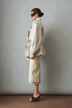 Women's cream belted trench coat with wide lapels