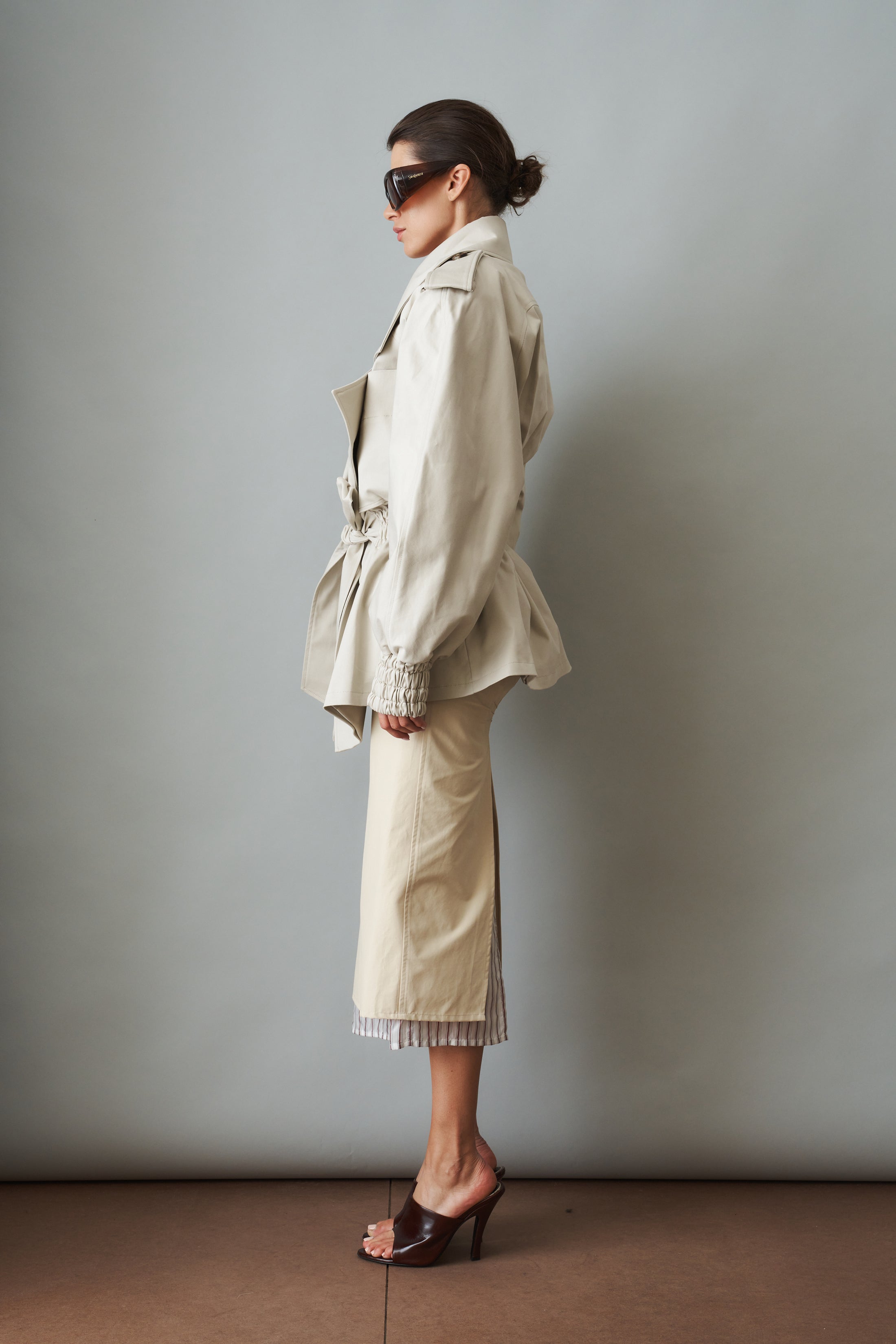 Women's cream belted trench coat with wide lapels