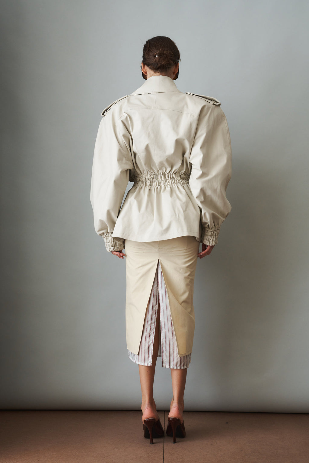 Women's cream belted trench coat with wide lapels