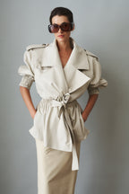 Women's cream belted trench coat with wide lapels