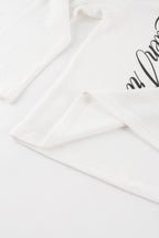 White waffle sweatshirt with black script graphic and long sleeves