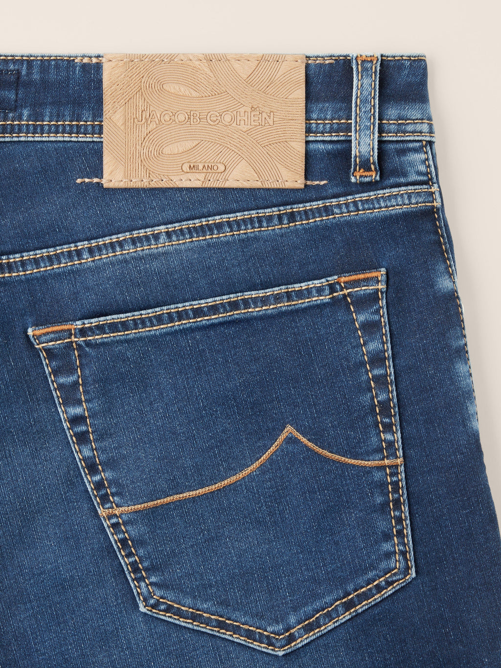 Blue straight-leg jeans with five-pocket styling