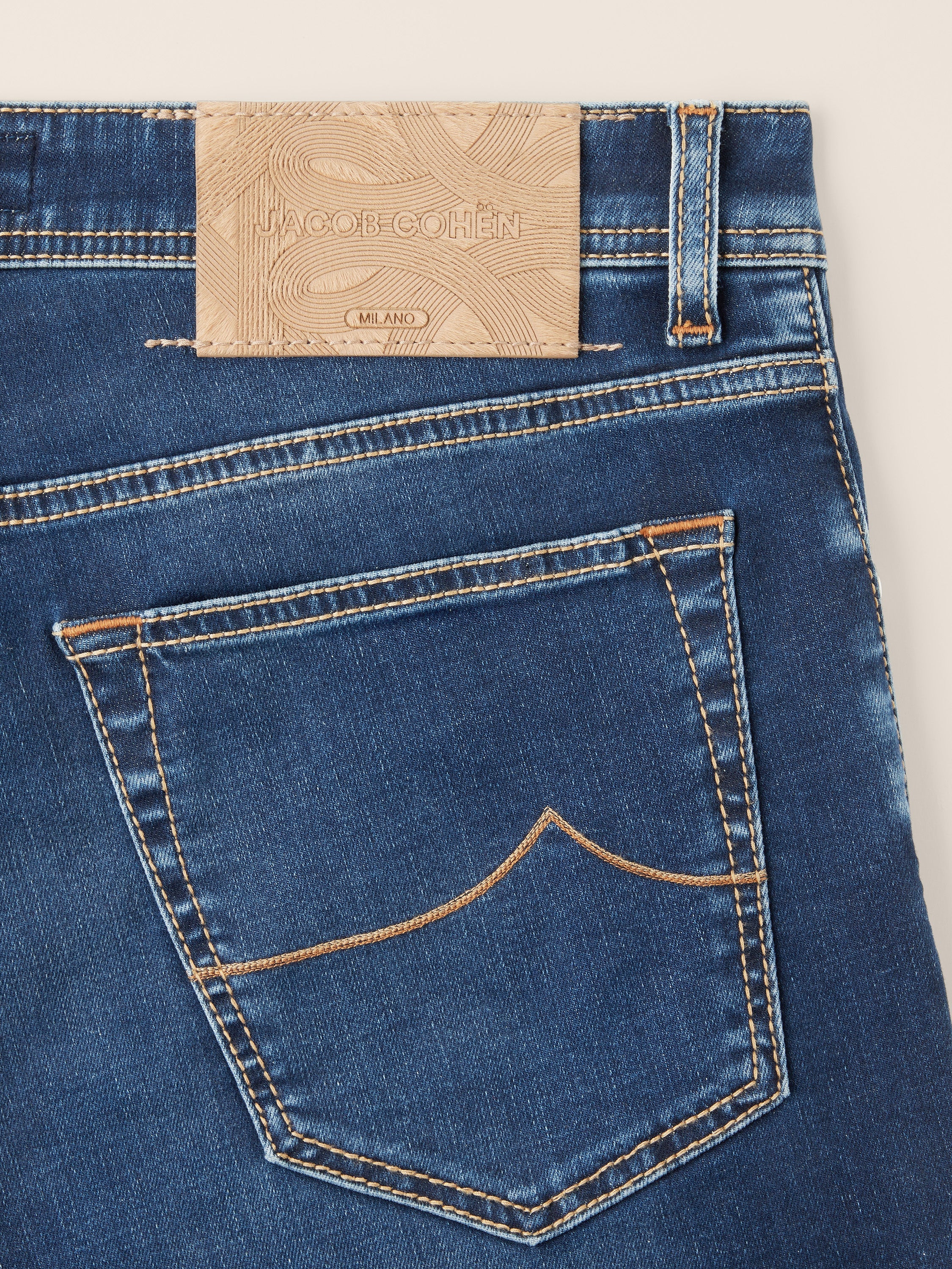 Blue straight-leg jeans with five-pocket styling
