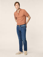 Blue straight-leg jeans with five-pocket styling