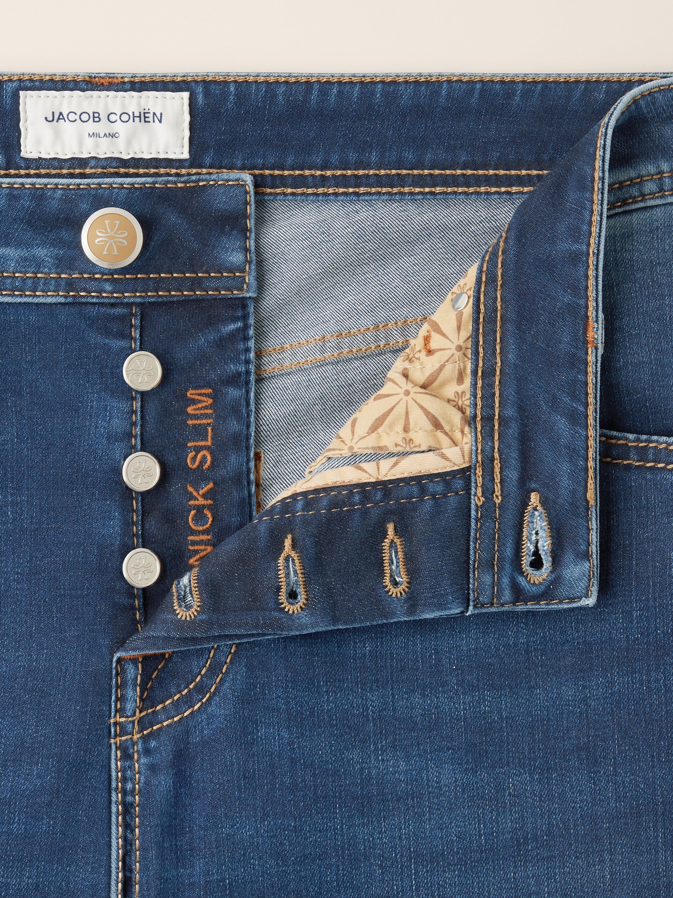 Blue straight-leg jeans with five-pocket styling