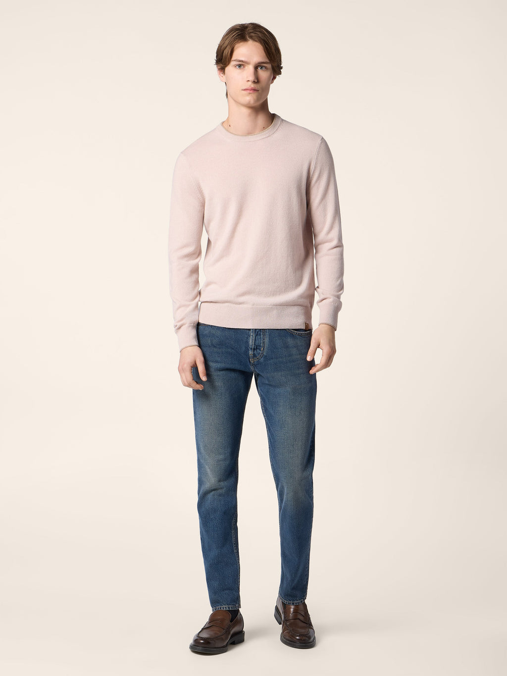 Men's pale pink crew neck jumper with long sleeves and ribbed trims