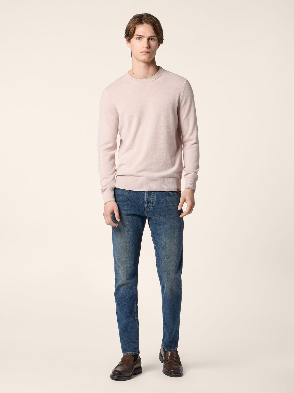 Men's pale pink crew neck jumper with long sleeves and ribbed trims
