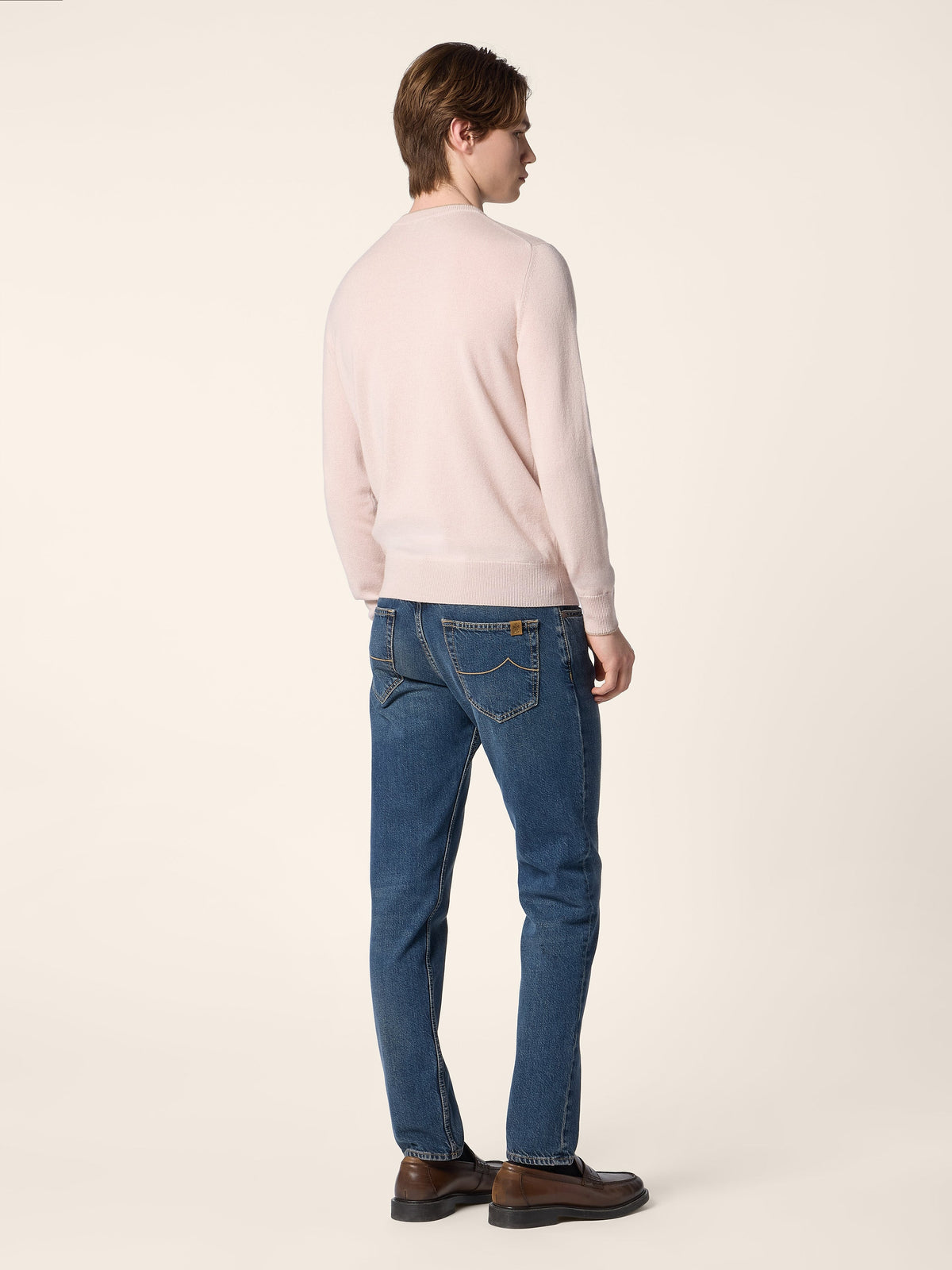 Men's pale pink crew neck jumper with long sleeves and ribbed trims