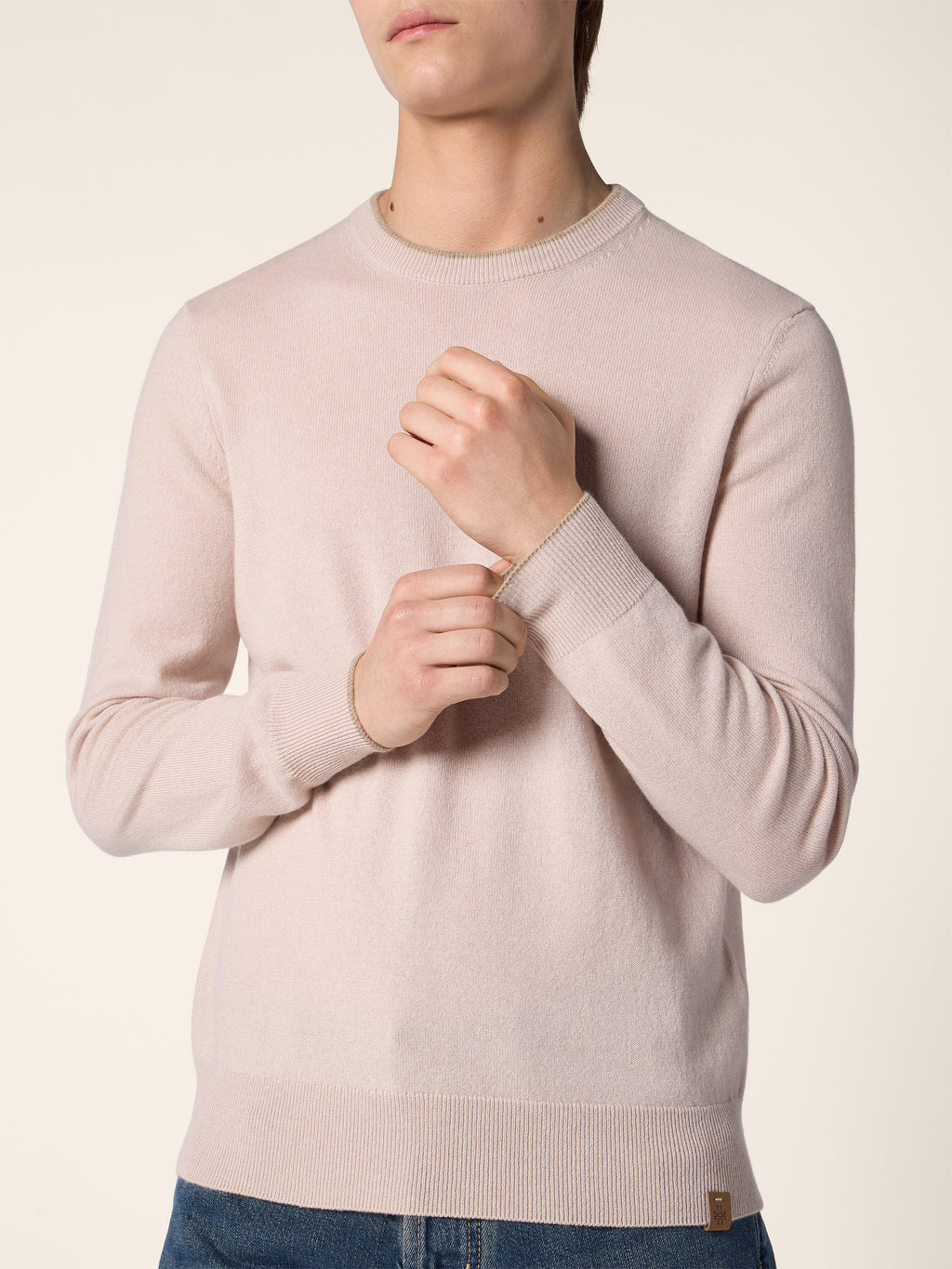 Men's pale pink crew neck jumper with long sleeves and ribbed trims
