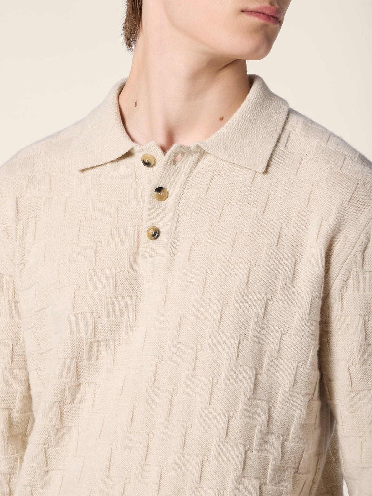 Men's cream textured polo jumper with long sleeves and button placket