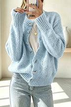 Women's knitted cardigan with scattered dots, long sleeves and button front