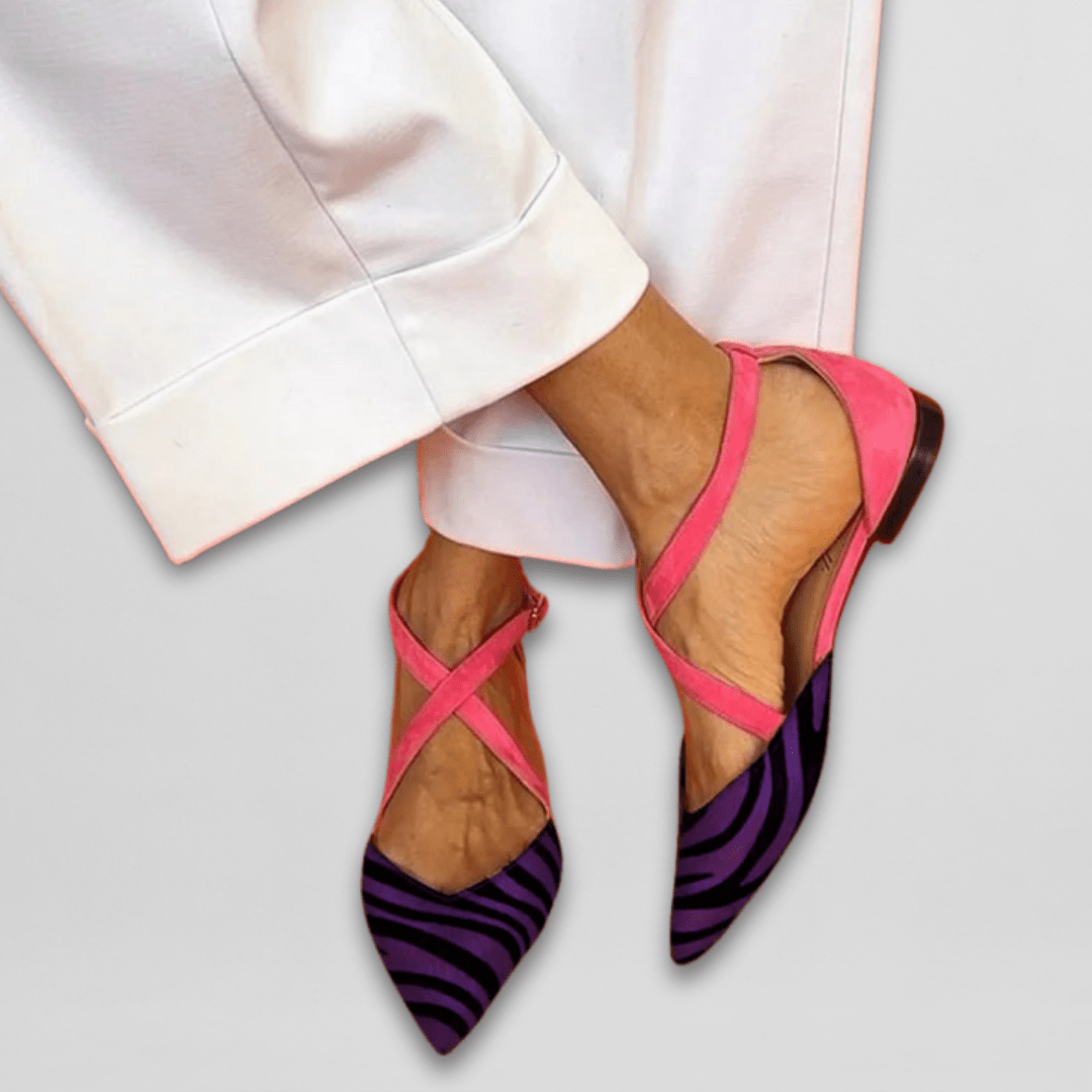 Women's pointed-toe ballet flats with cross-over ankle straps and striped toes