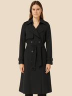 Women's belted double-breasted trench coat with long sleeves and lapel collar