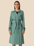 Women's belted double-breasted trench coat with long sleeves and lapel collar